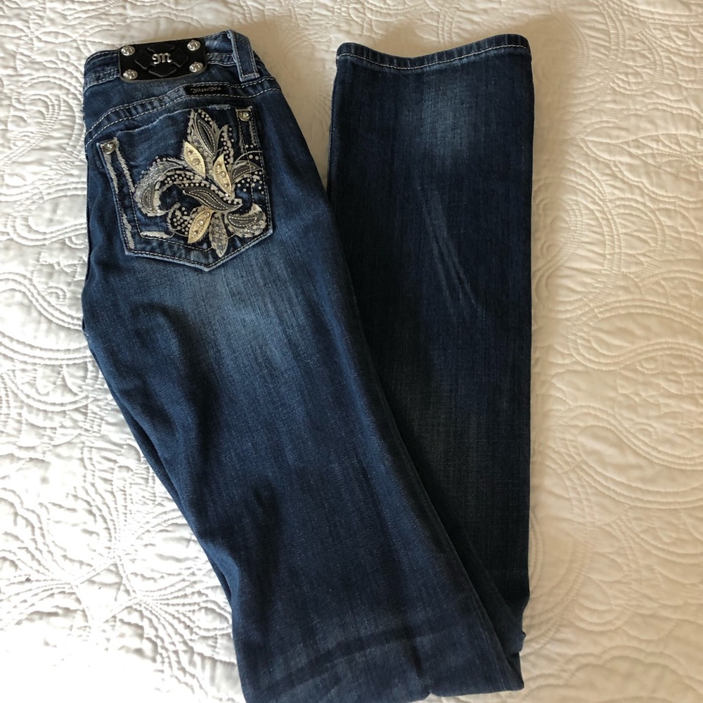 Designer jeans with detailed pockets